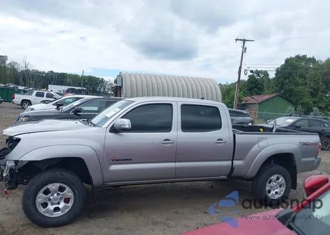 2014 Toyota Tacoma Base V6 z USA, uszkodzony, nr VIN 3TMMU4FN9EM064381
